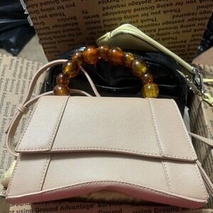 Elegant Beige Handbag with Amber Beaded  Handle and crossbody strap